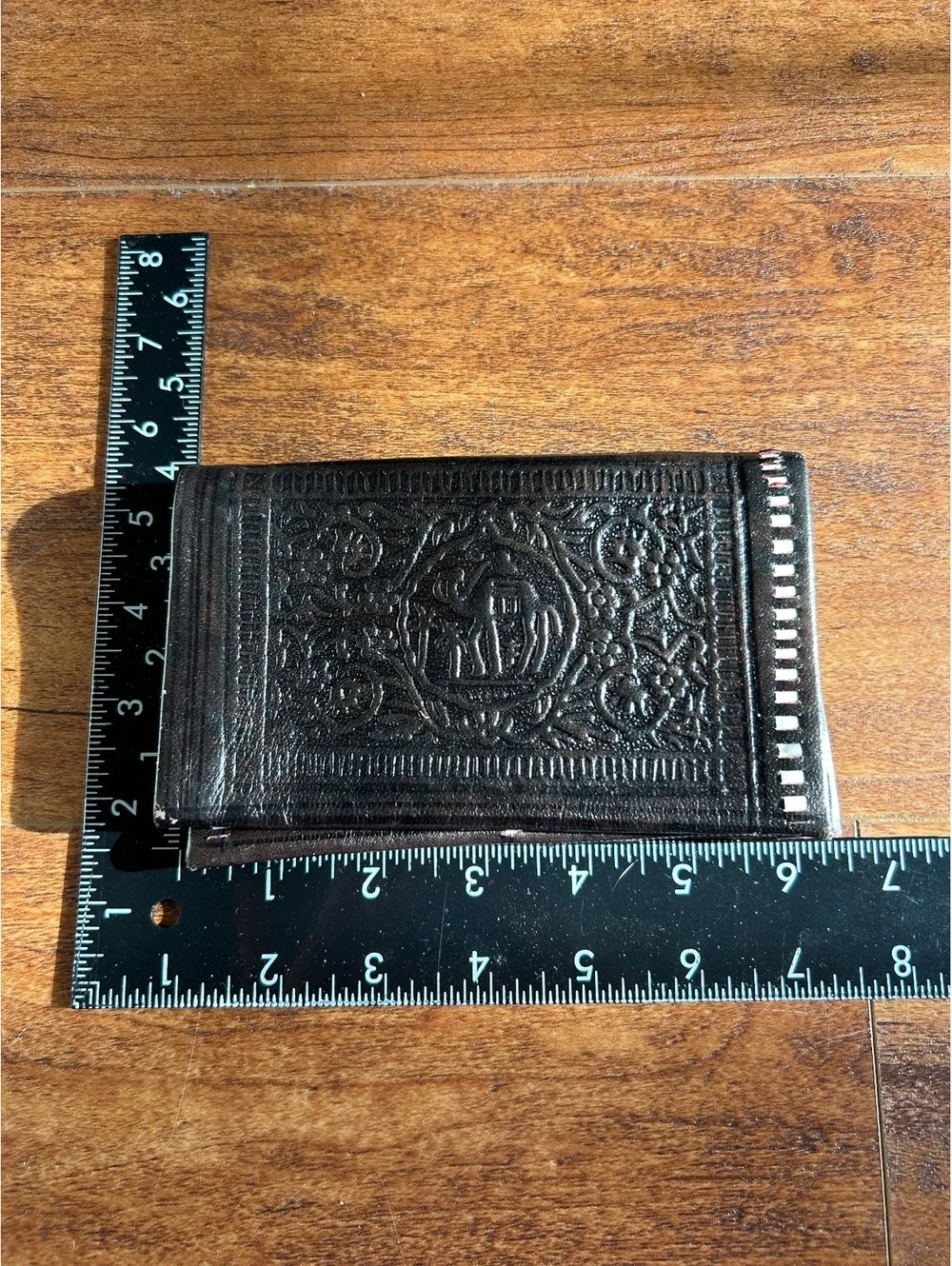 Vintage Embossed Black Leather Wallet with Intricate Design